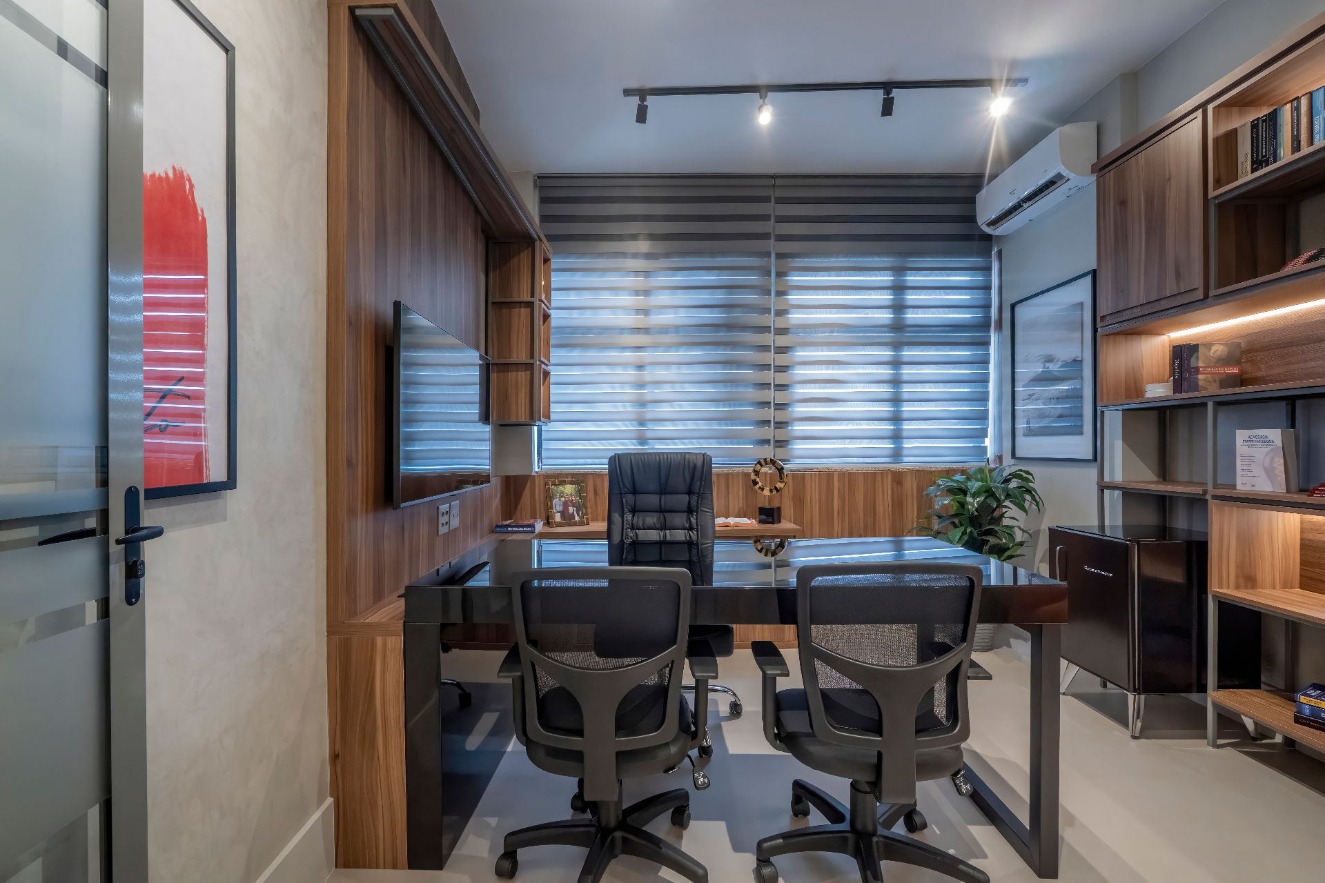 Sala de reuniões da AMX Advocacia — ambiente acolhedor e privado no Rio de Janeiro